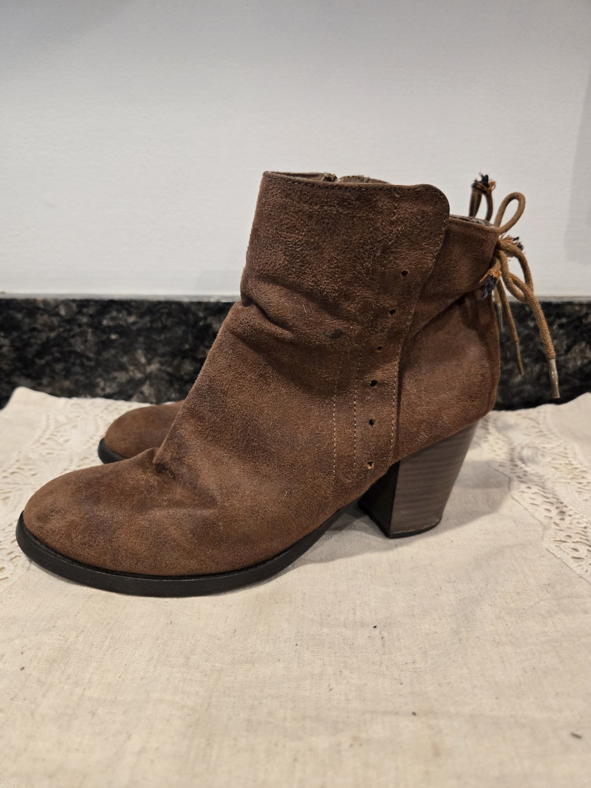 Massini Women’s Brown Suede Ankle Booties, Tasseled Accent, Zip Closure