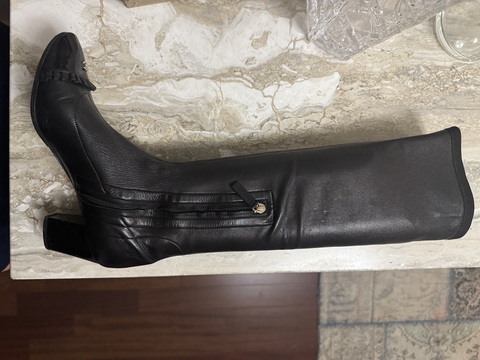 CHANEL Women’s Black Leather Knee High Boots Almond Toe Zip Logo Ruffle Sz 8.5