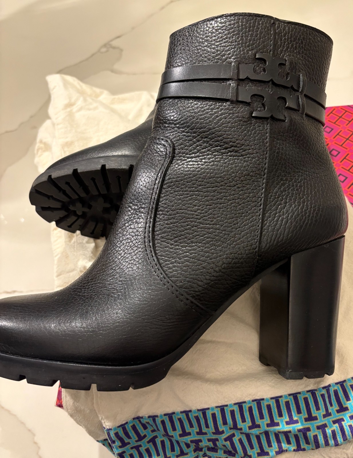 Tory burch Leigh 90mm Lug Sole Pebbled Leather 3″ heeled Bootie In black w logo
